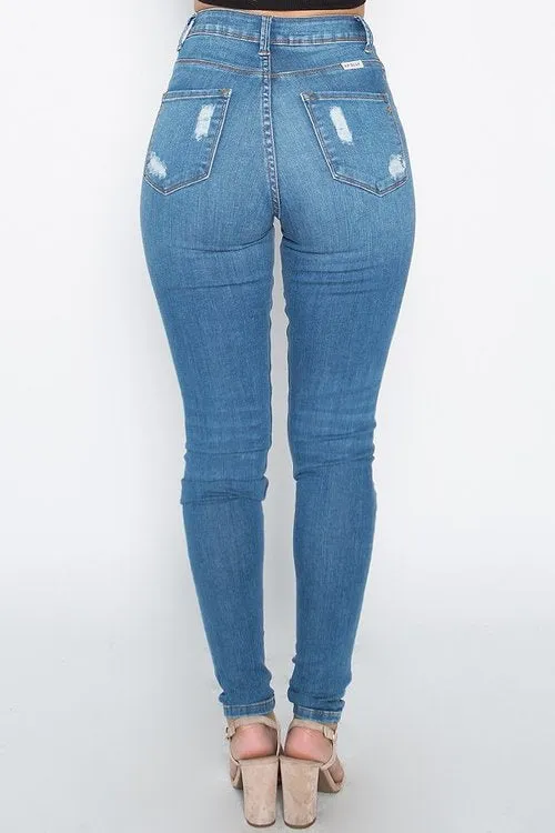 High waisted distressed cutout denim jeans